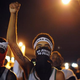Protesters take part in a peaceful protest along a street in Ferguson, Mo., on Aug. 19, 2014.
Michael B. Thomas/AFP/Getty Images